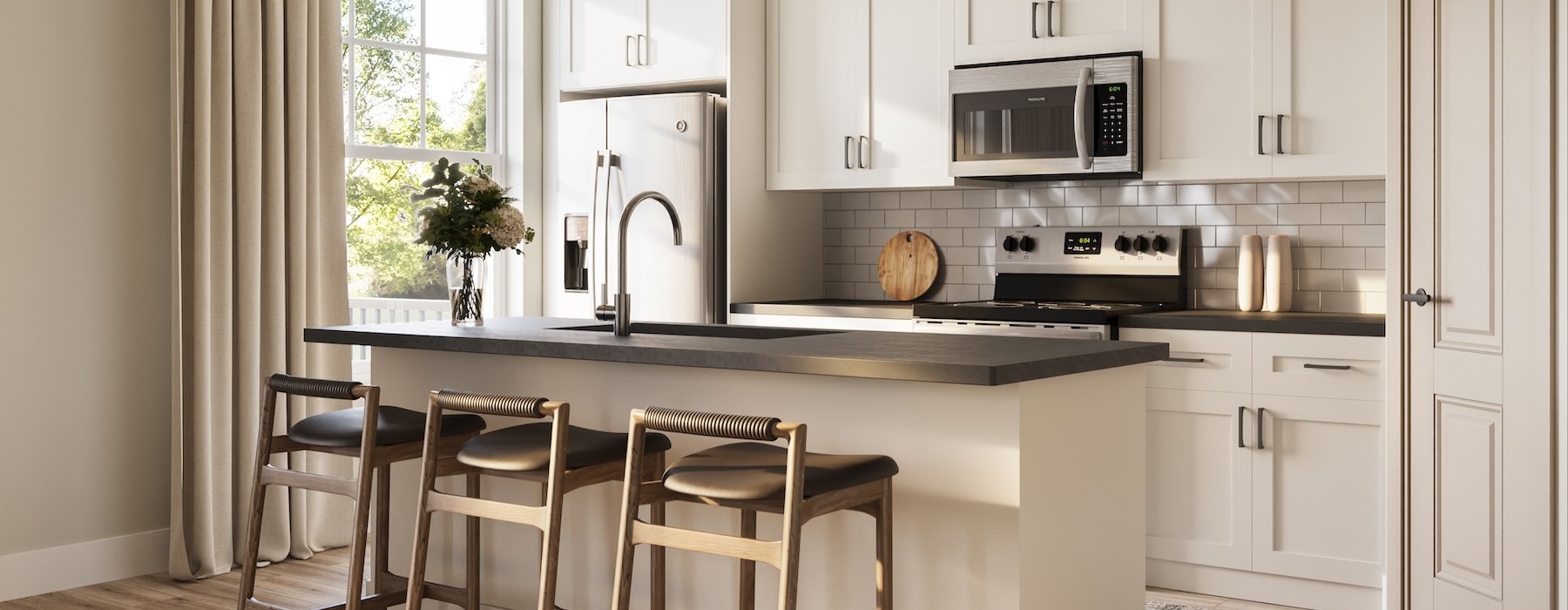 a kitchen with white cabinets