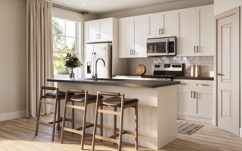 a kitchen with white cabinets