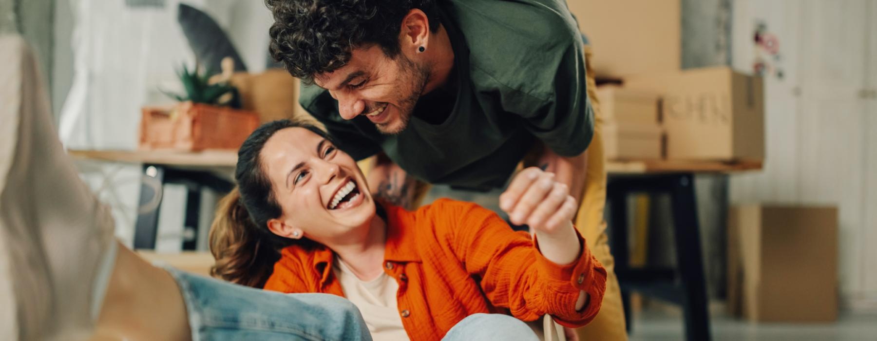 a man and a woman laughing